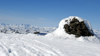 Høgeloft - 1920 moh. Hurrungane i horisonten.